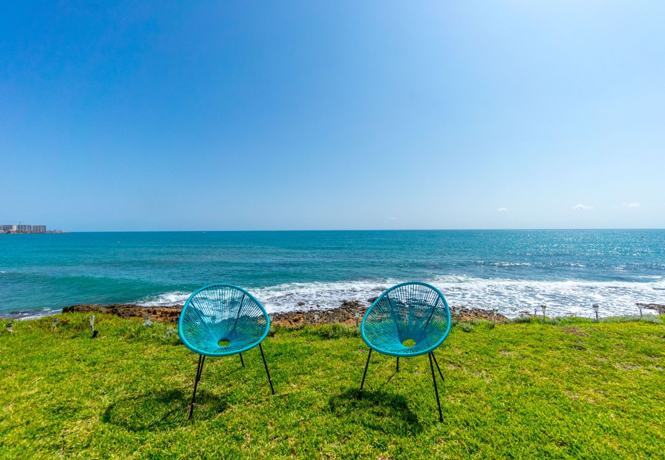 Bungalow en Orihuela Costa - OCEAN GARDEN by the Sea EGVT-1401-A