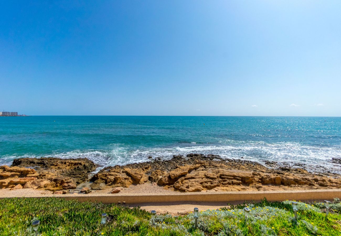 Bungalow in Orihuela Costa - OCEAN GARDEN by the Sea EGVT-1401-A